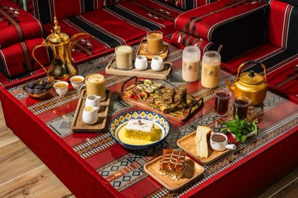 A majlis breakfast spread with coffee