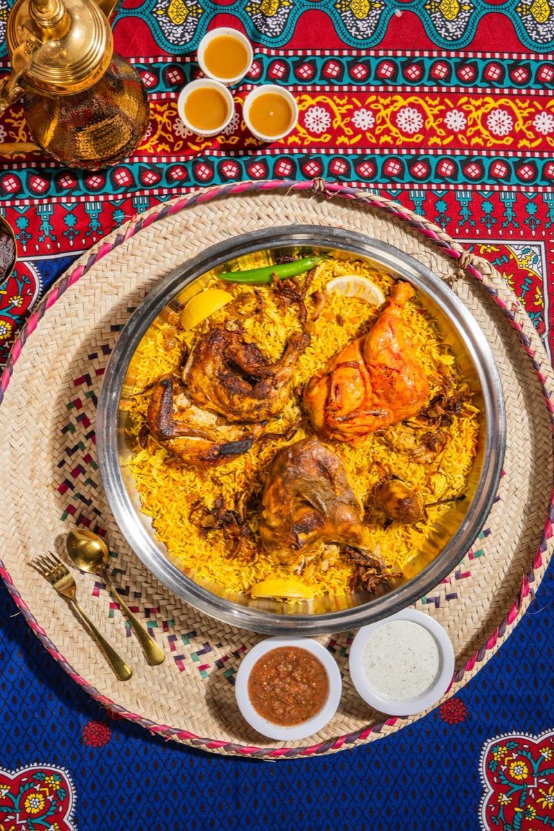 A platter of golden Yemeni chicken mandi
